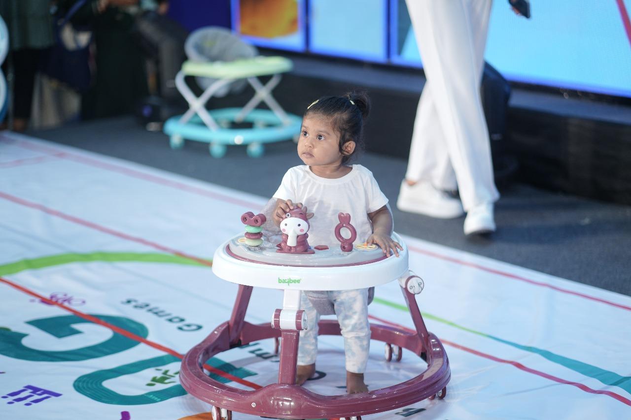 Baby smiling during event